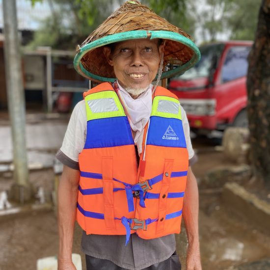 Indonesia fisherman wearing lifevest