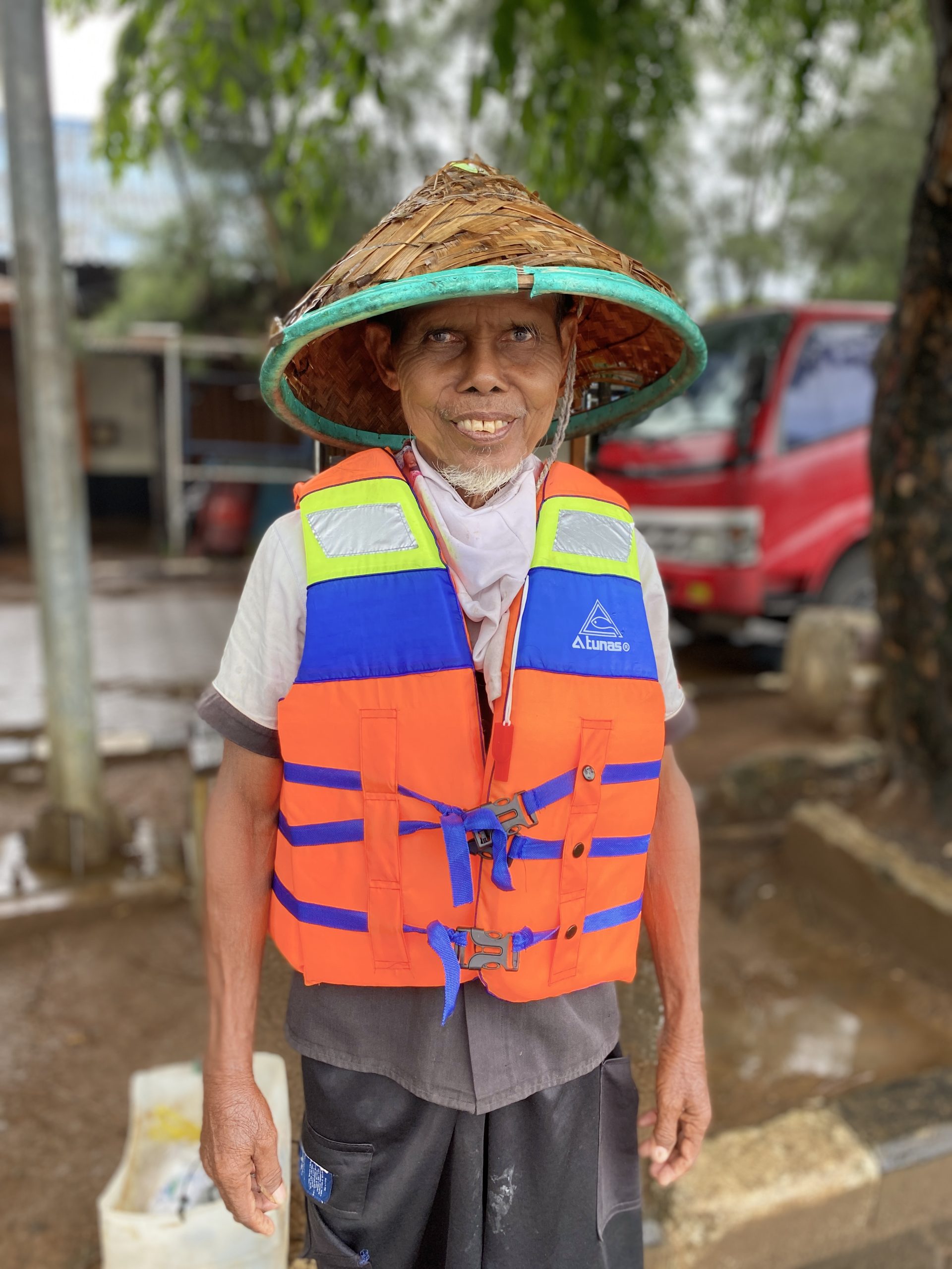 Indonesia fisherman wearing lifevest